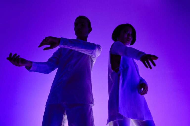 Low Angle Shot of Man and Woman in White Long Sleeves