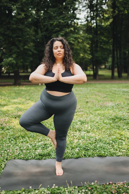 Woman in Sportswear Doing Yoga