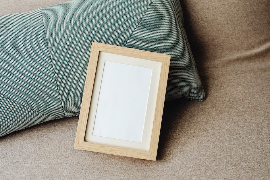 Brown Wooden Empty Frame on Gray Textile