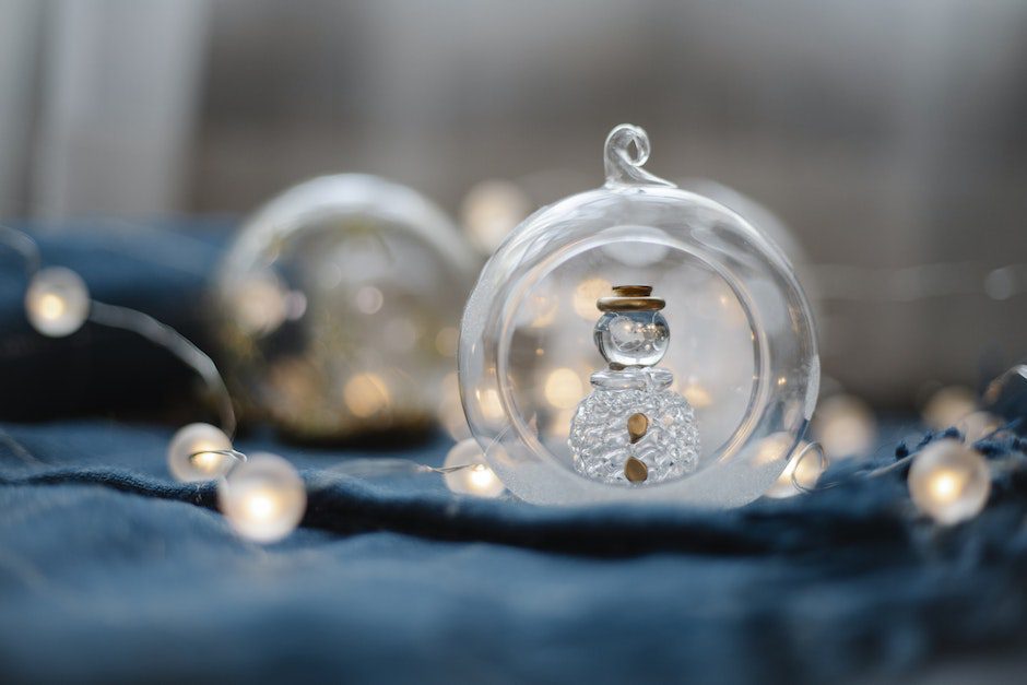 Glass ball near fairy lights